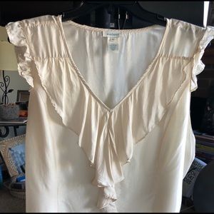 Sleeveless cream colored top